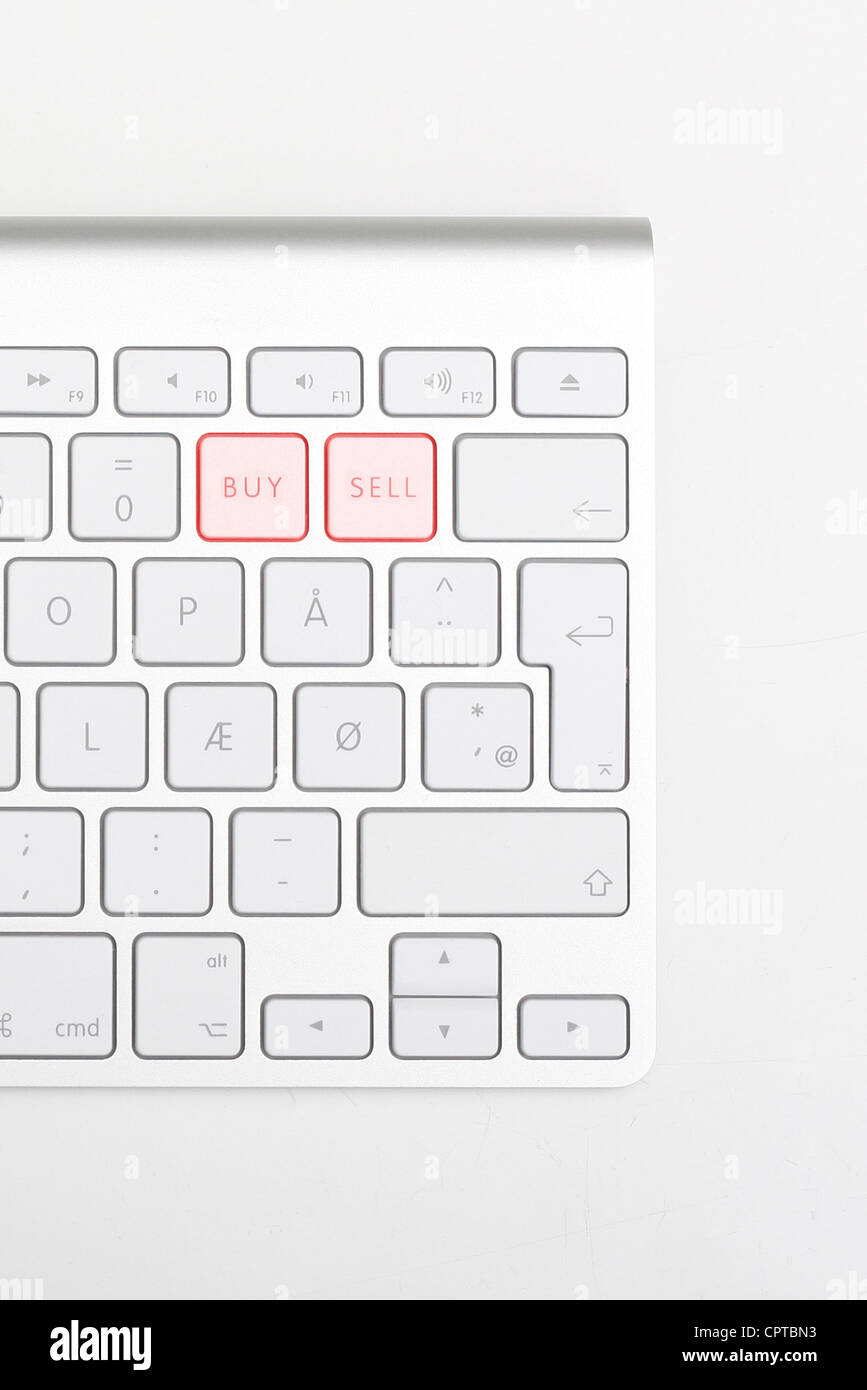 Keyboard showing buy sell buttons Stock Photo Alamy