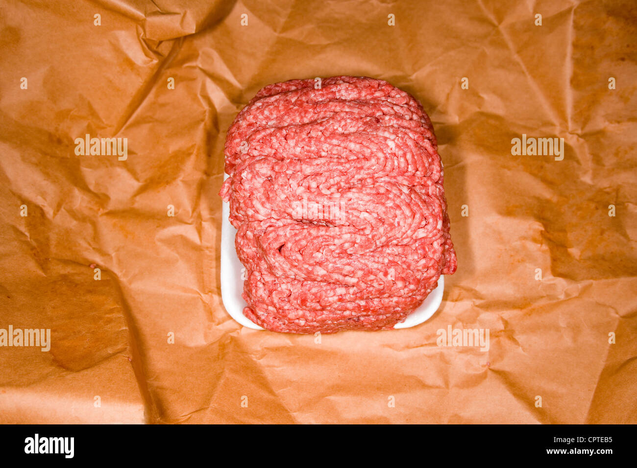Raw minced beef on brown paper Stock Photo