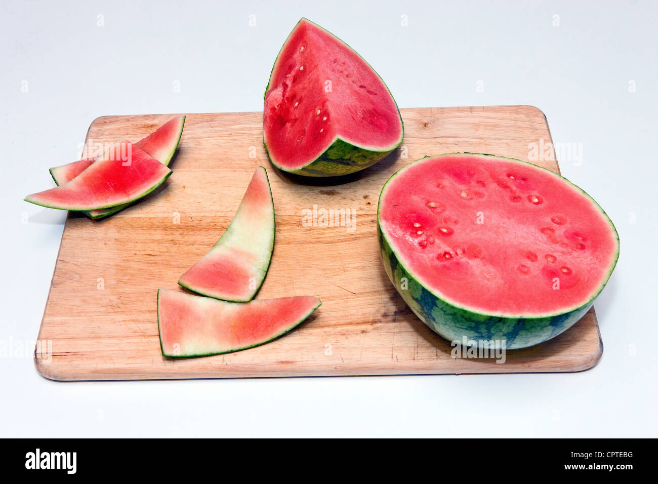Slices of ripe watermelon on cutting board Stock Photo