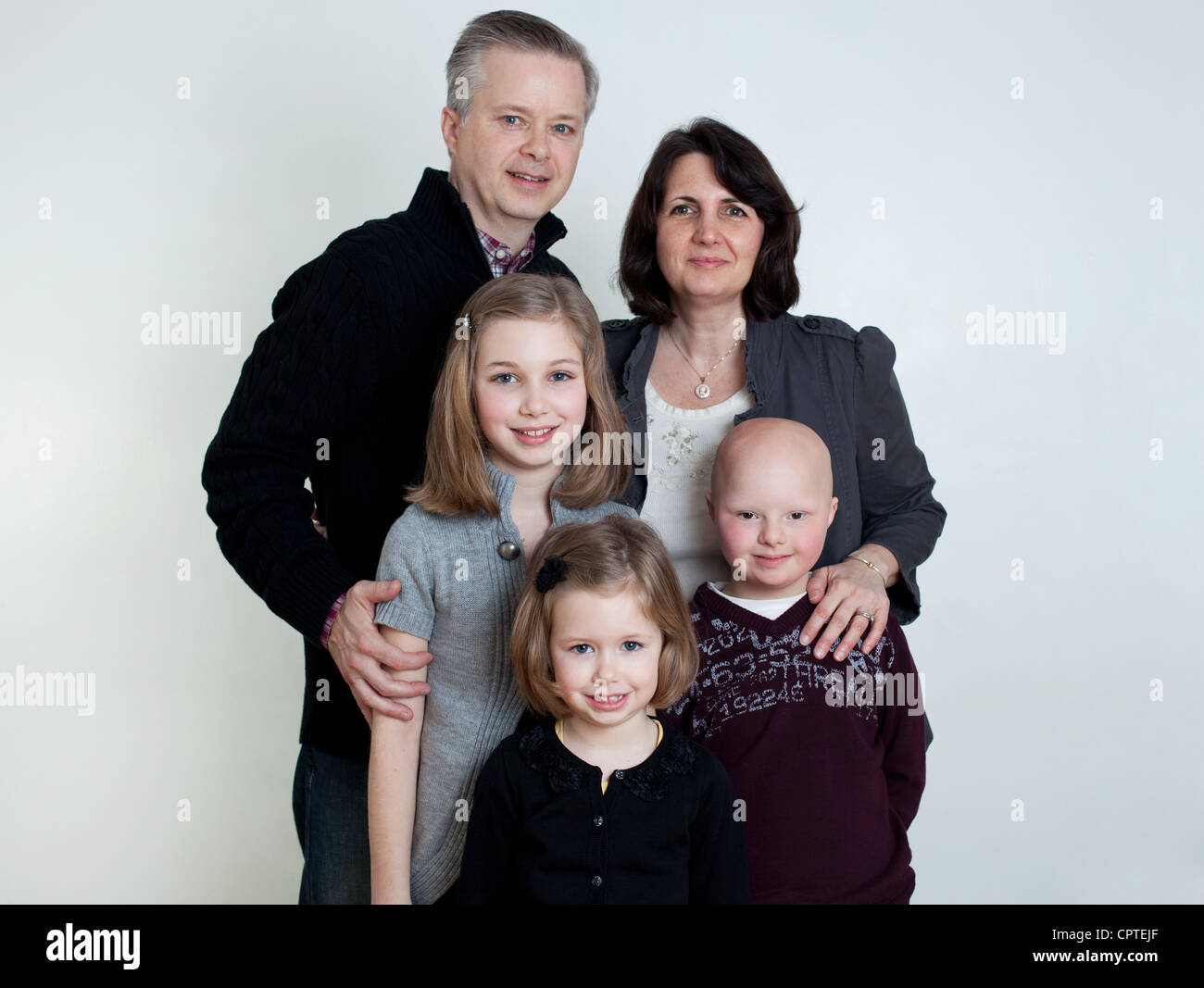 Family portrait with two daughters and son with Down's Syndrome Stock Photo