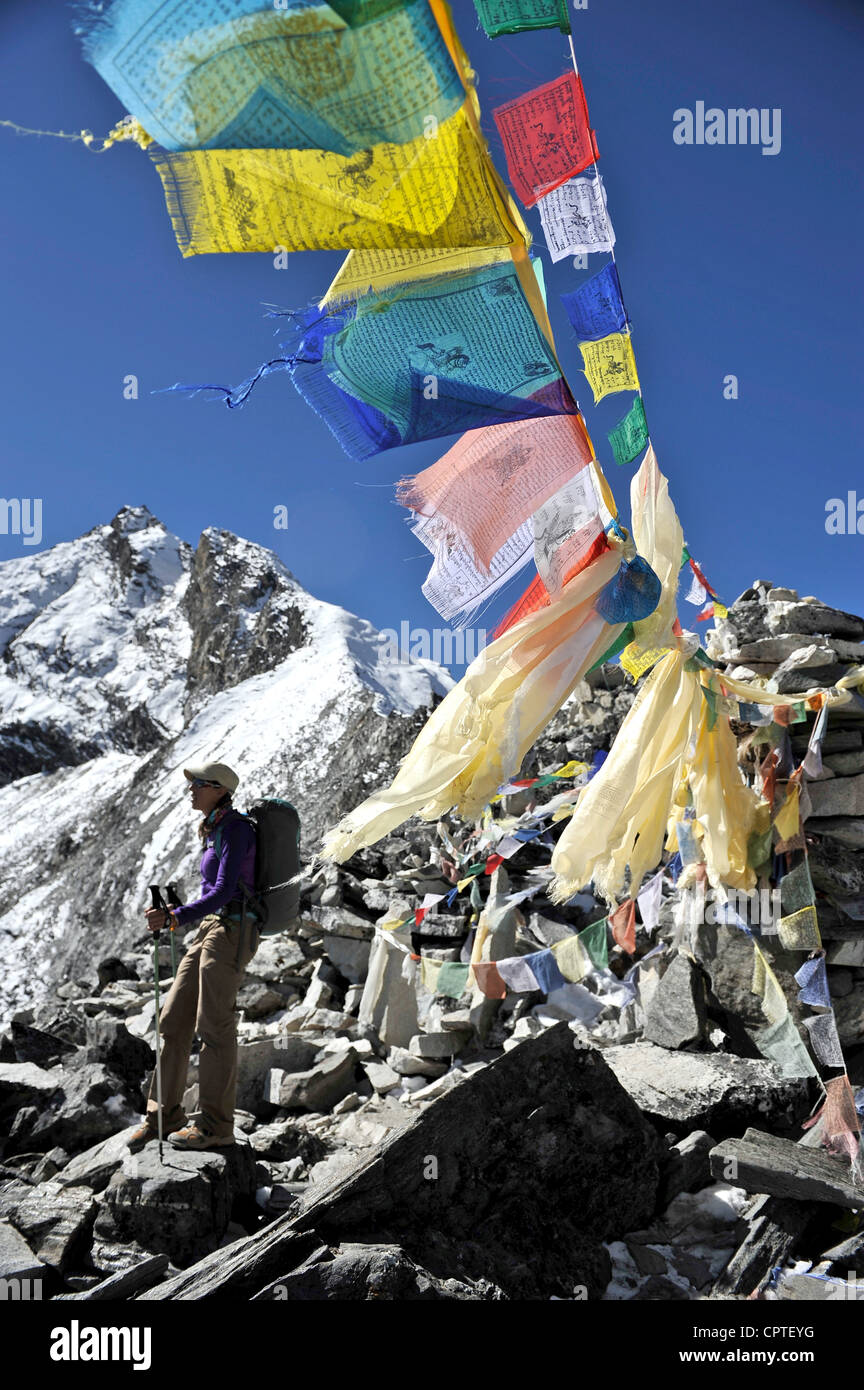 Female trekker at Kongma La above the village of Chhukung, Nepal Stock Photo