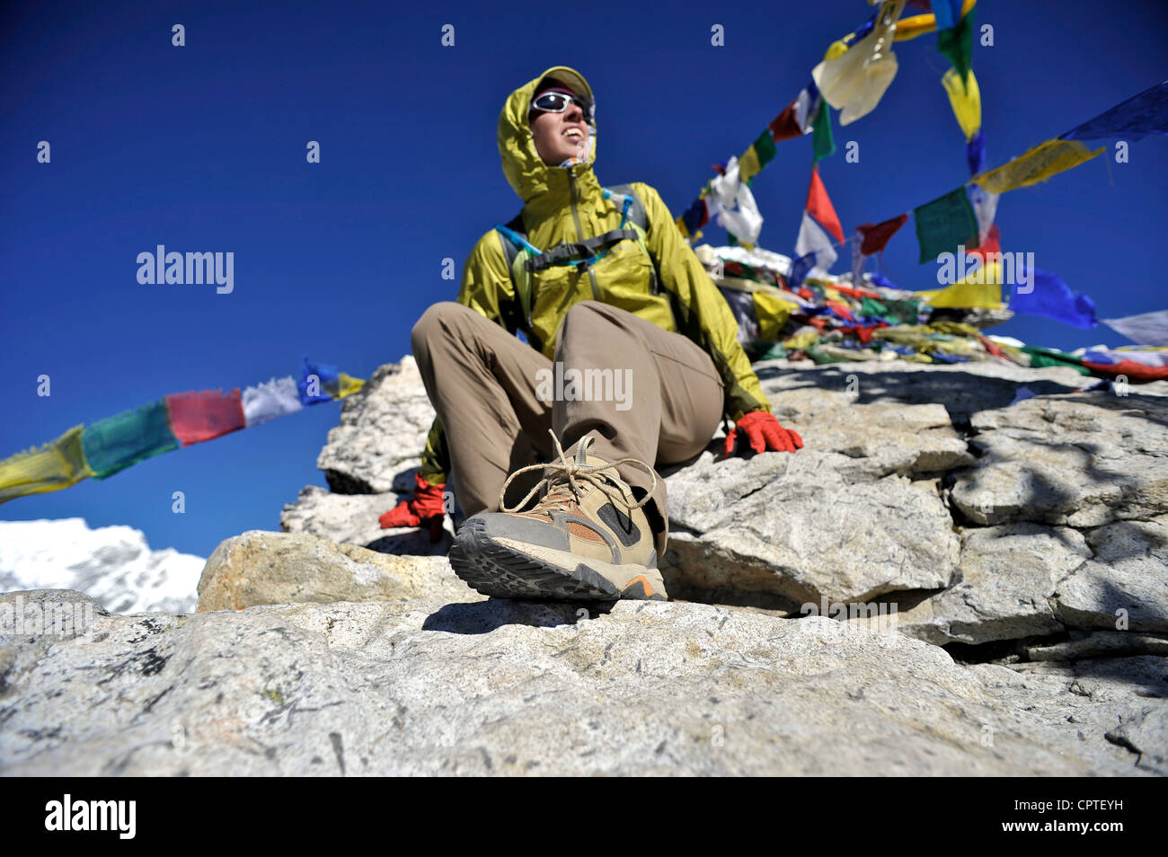 Female trekker on the summit of Kala Patthar, Chhukung, Nepal Stock Photo