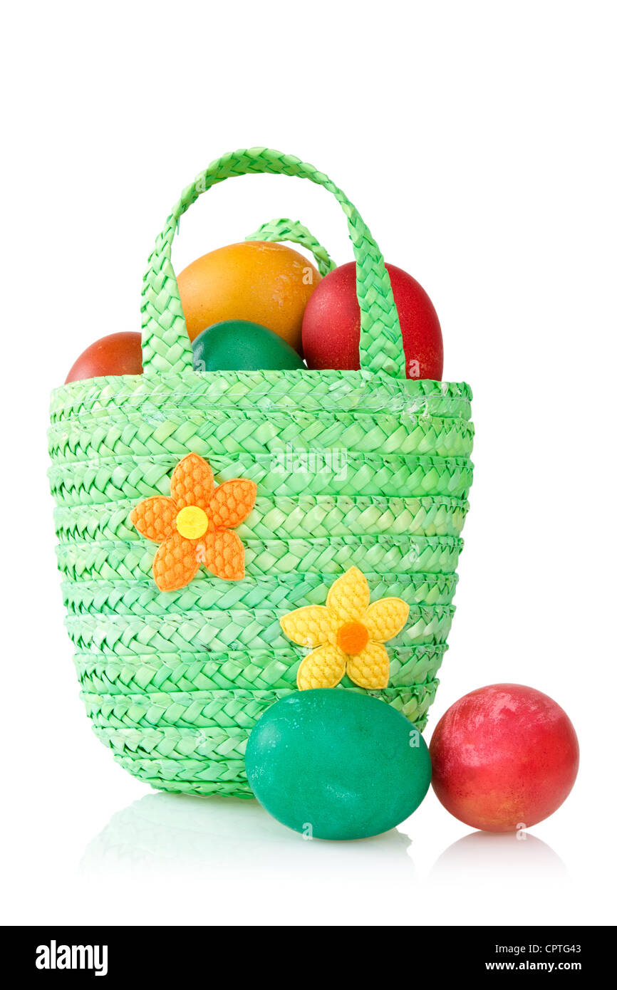 Easter eggs in the decorative basket on white background Stock Photo ...