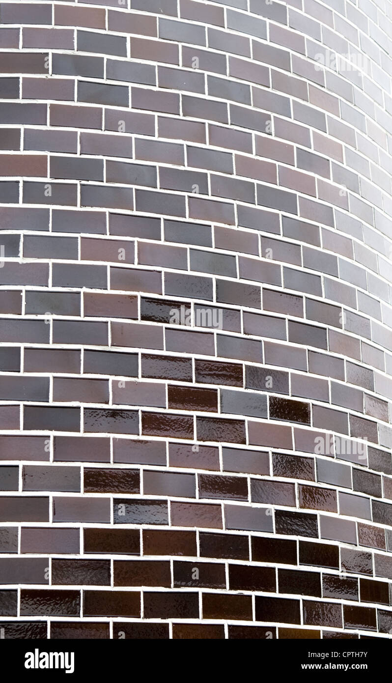 Abstract dark background with chamfered corner of decorative brick wall ...