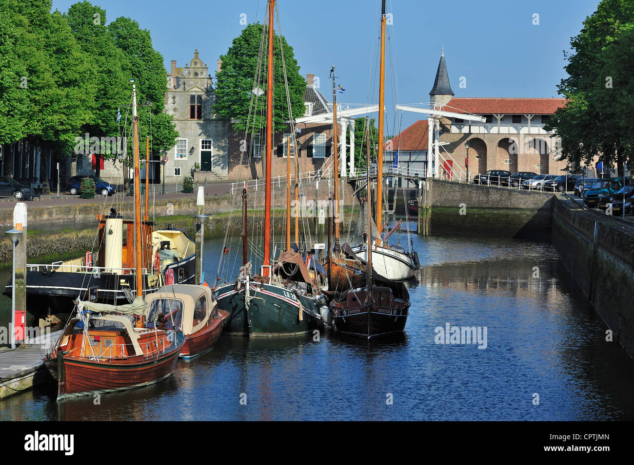 Historical wooden fishing boats of the Zeeland Harbour Museum in the Old Port at Zierikzee, Zealand, the Netherlands Stock Photo