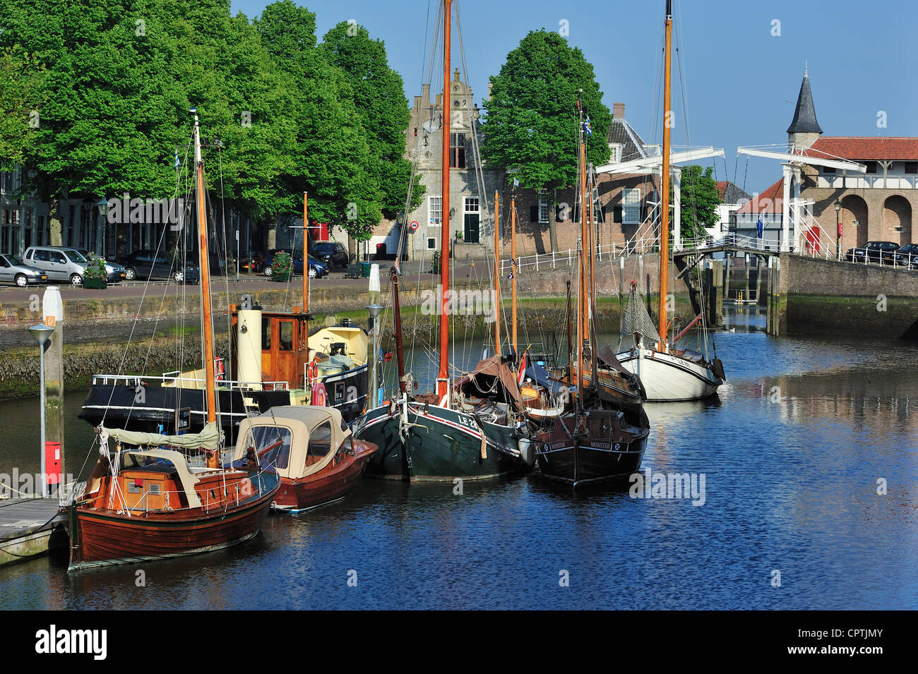 Historical wooden fishing boats of the Zeeland Harbour Museum in the Old port at Zierikzee, Zealand, the Netherlands Stock Photo