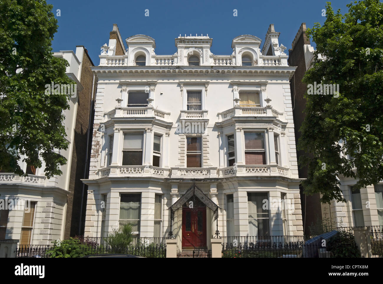 large detached 1862 house, with a grade II listing,  in italianate style, now divided into flats in holland park, london, england Stock Photo