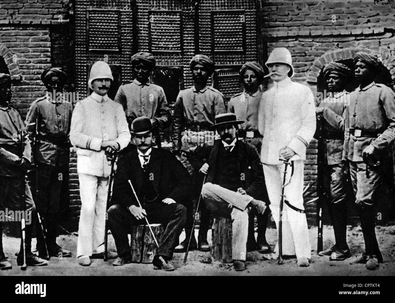 Wissmann, Hermann von, 4.9.1853 - 15.6.1905, German Africa explorer, group picture (Wissmann sitting, on the left), with three officers and Sudanese soldiers, Stock Photo
