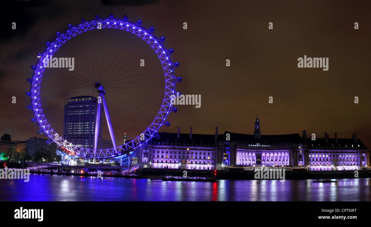 The London Eye and the old County Hall lit up at night Stock Photo - Alamy