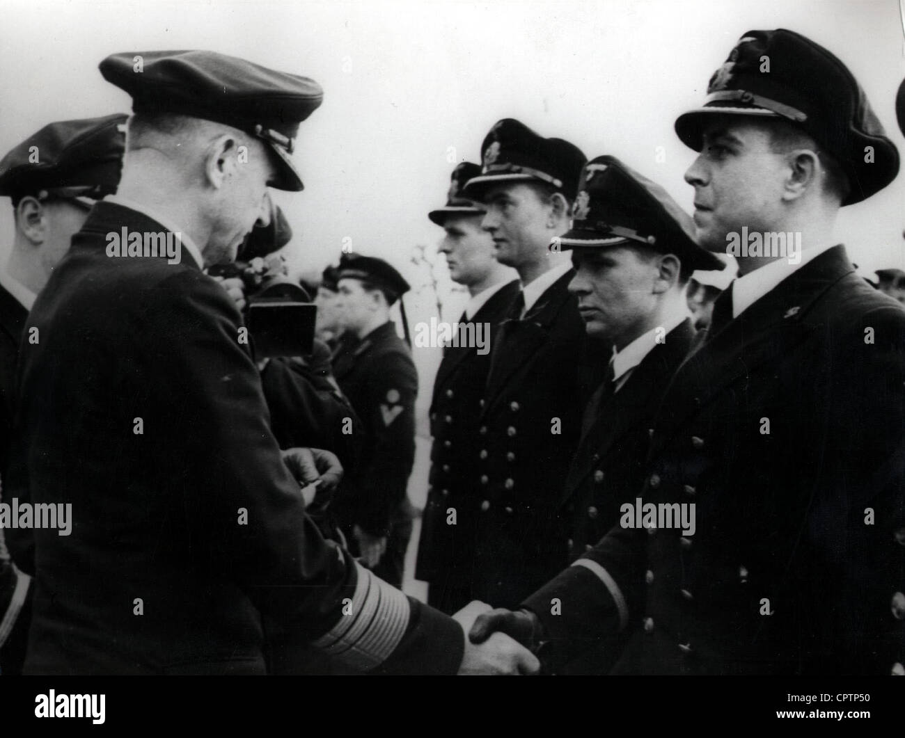 Doenitz, Karl, 16.9.1891 - 24.12.1980, German admiral, commander of the submarine fleet, scene, decorating officers, 1942, right hand: Lothar Guenther Buchheim, Stock Photo
