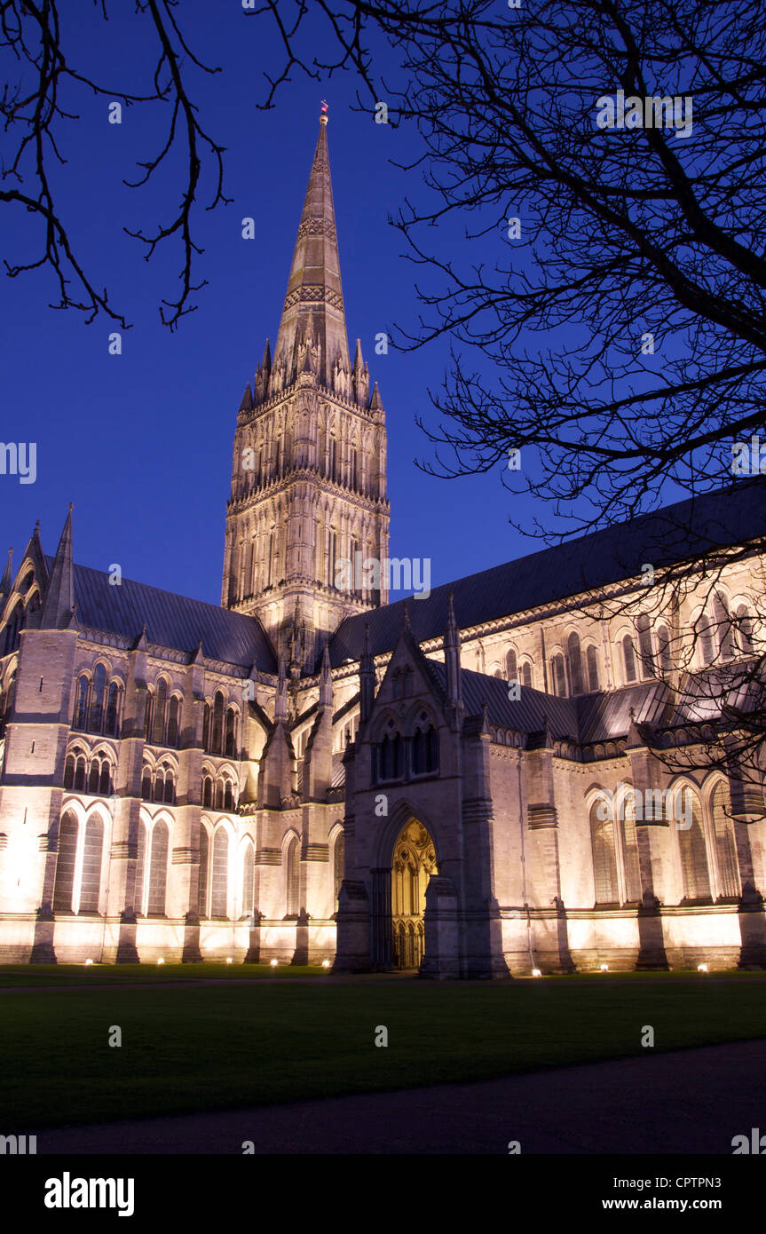 Salisbury Cathedral floodlit on a clear winter evening. Its tall elegant medieval spire pointing to the heavens. Wiltshire, England, United Kingdom. Stock Photo