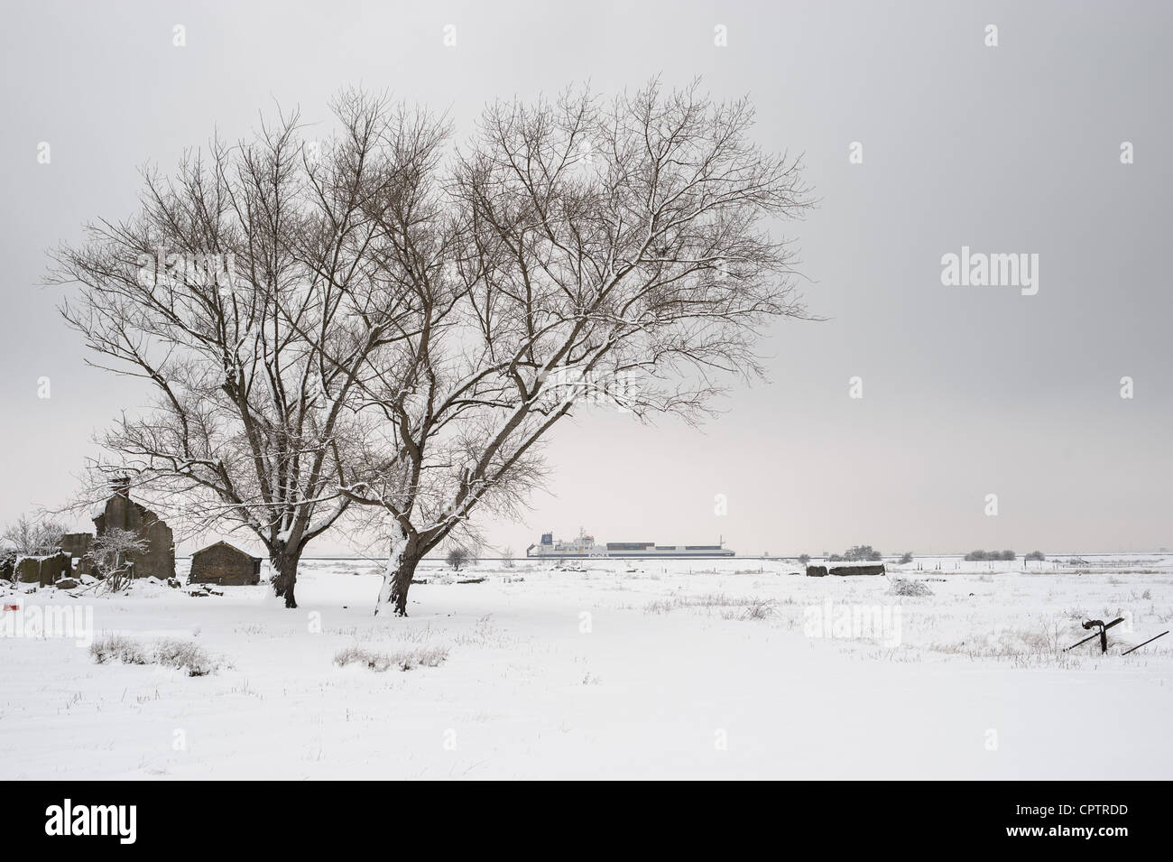 Winter snows comes to the Hoo peninsula, Kent England. Sight of the proposed fourth London airport. Stock Photo