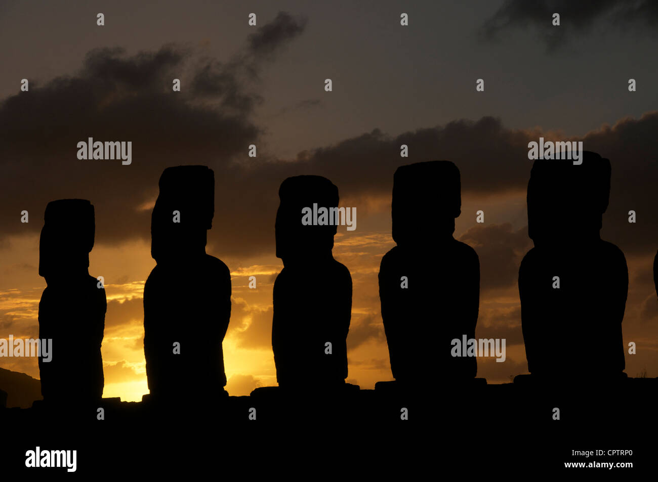 Five Moai at sunrise Ahu Tongarika Easter Island Chile Stock Photo