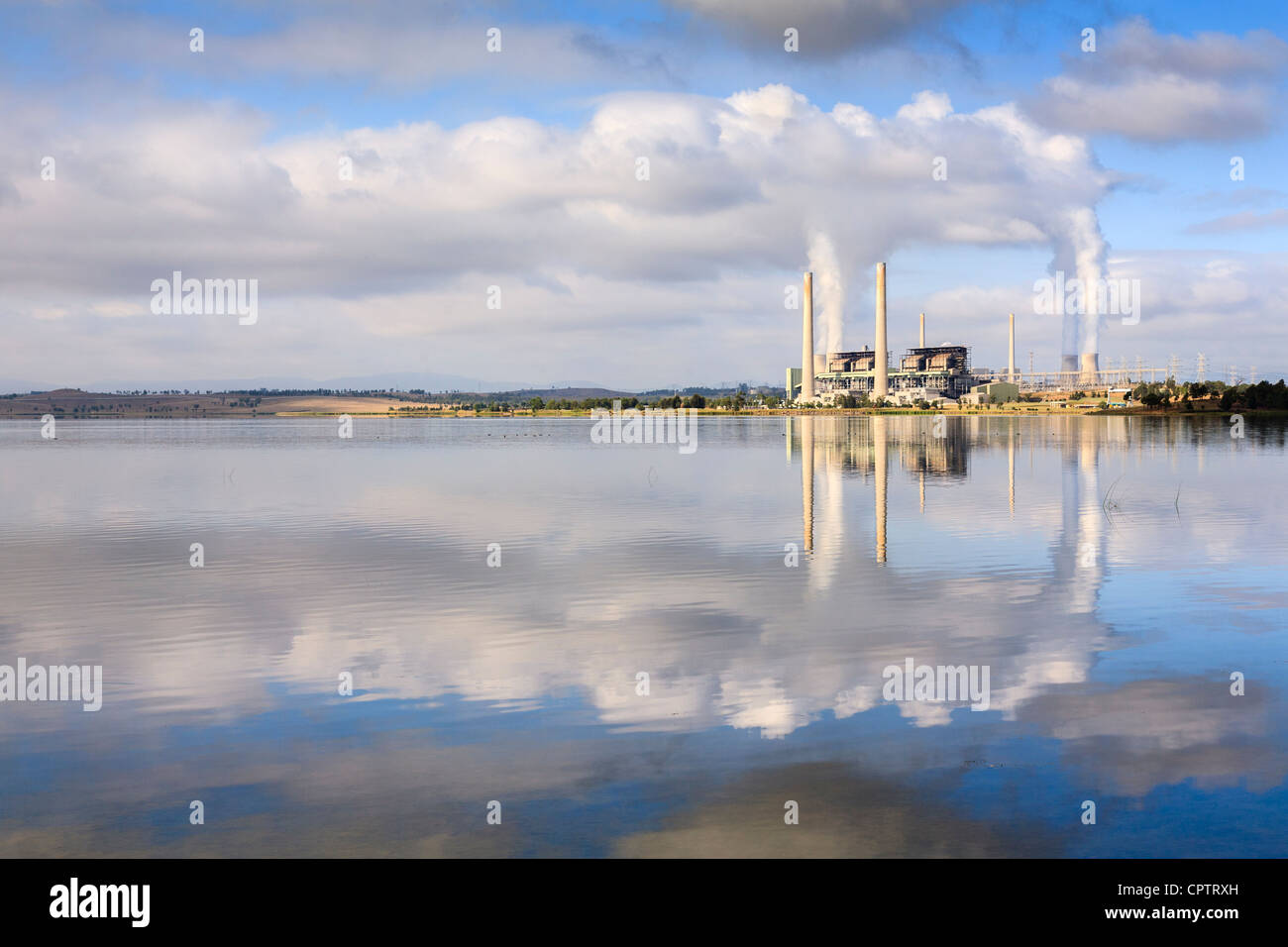 Lake Liddell coal fired power station, reflecting in Lake Liddell, NSW, Australia. Stock Photo