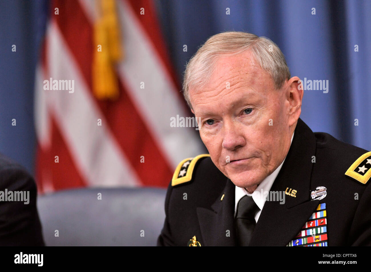 Chairman of the Joint Chiefs of Staff Army Gen. Martin E. Dempsey answers a question during a press briefing at the Pentagon May 10, 2012. Stock Photo