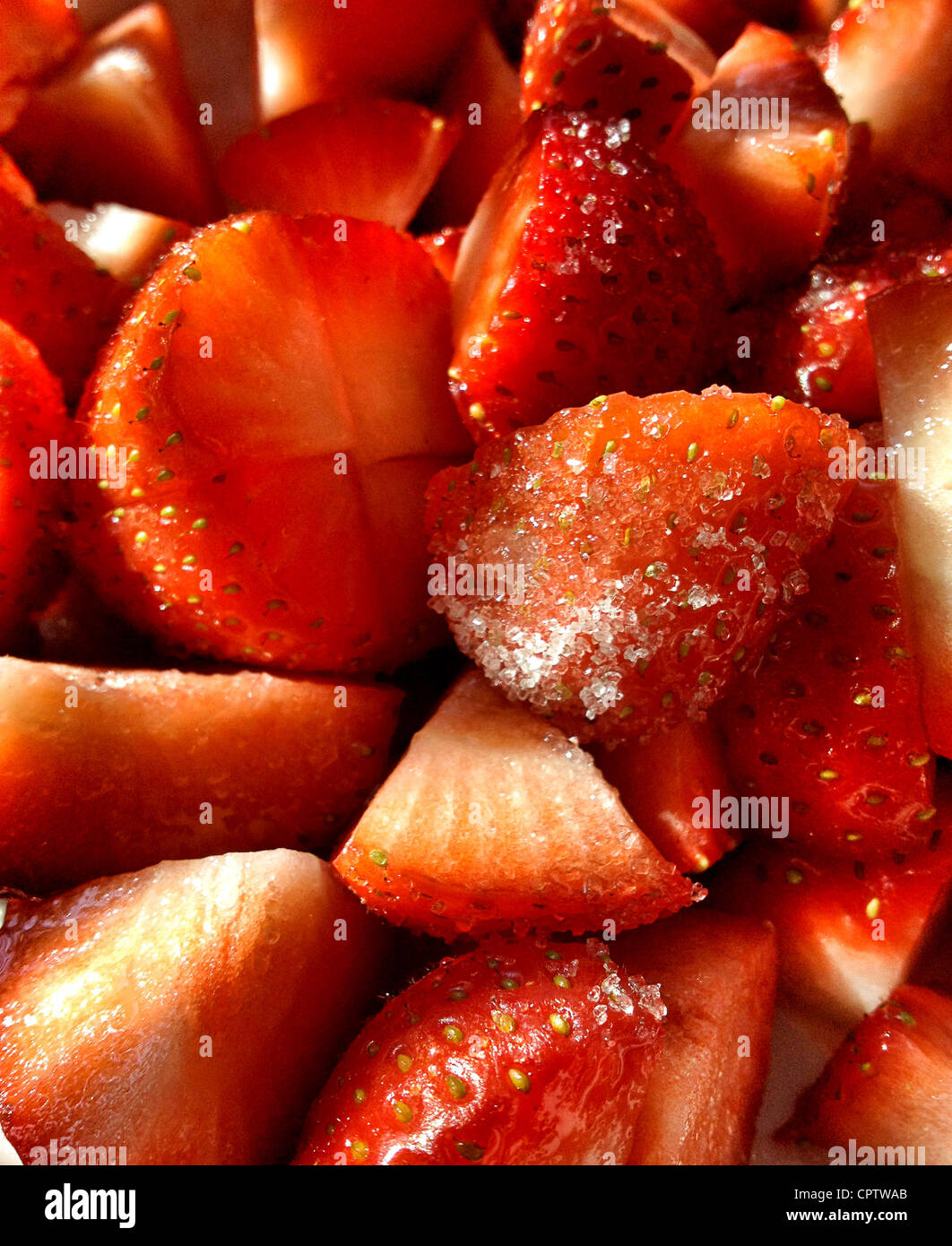 A bowl of fresh English strawberries covered in sugar Stock Photo - Alamy