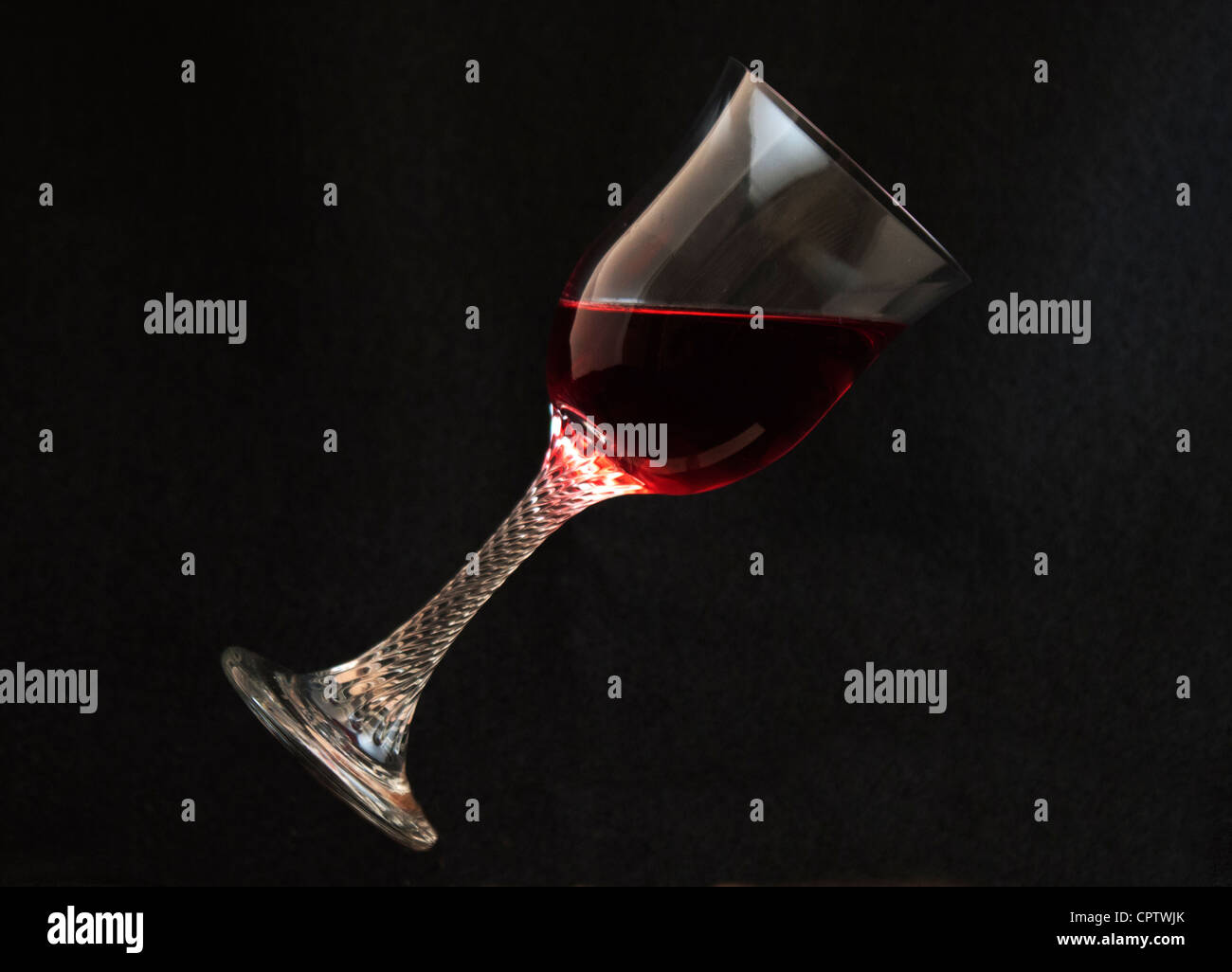 Tilted Wine glass Stock Photo Alamy