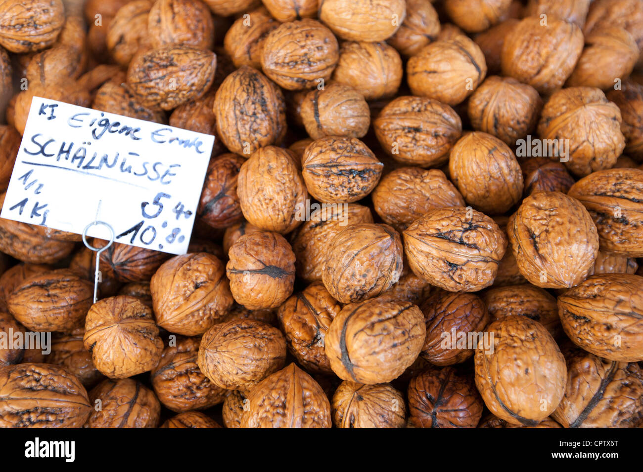Fresh walnuts on sale in food market at Viktualienmarkt in Munich