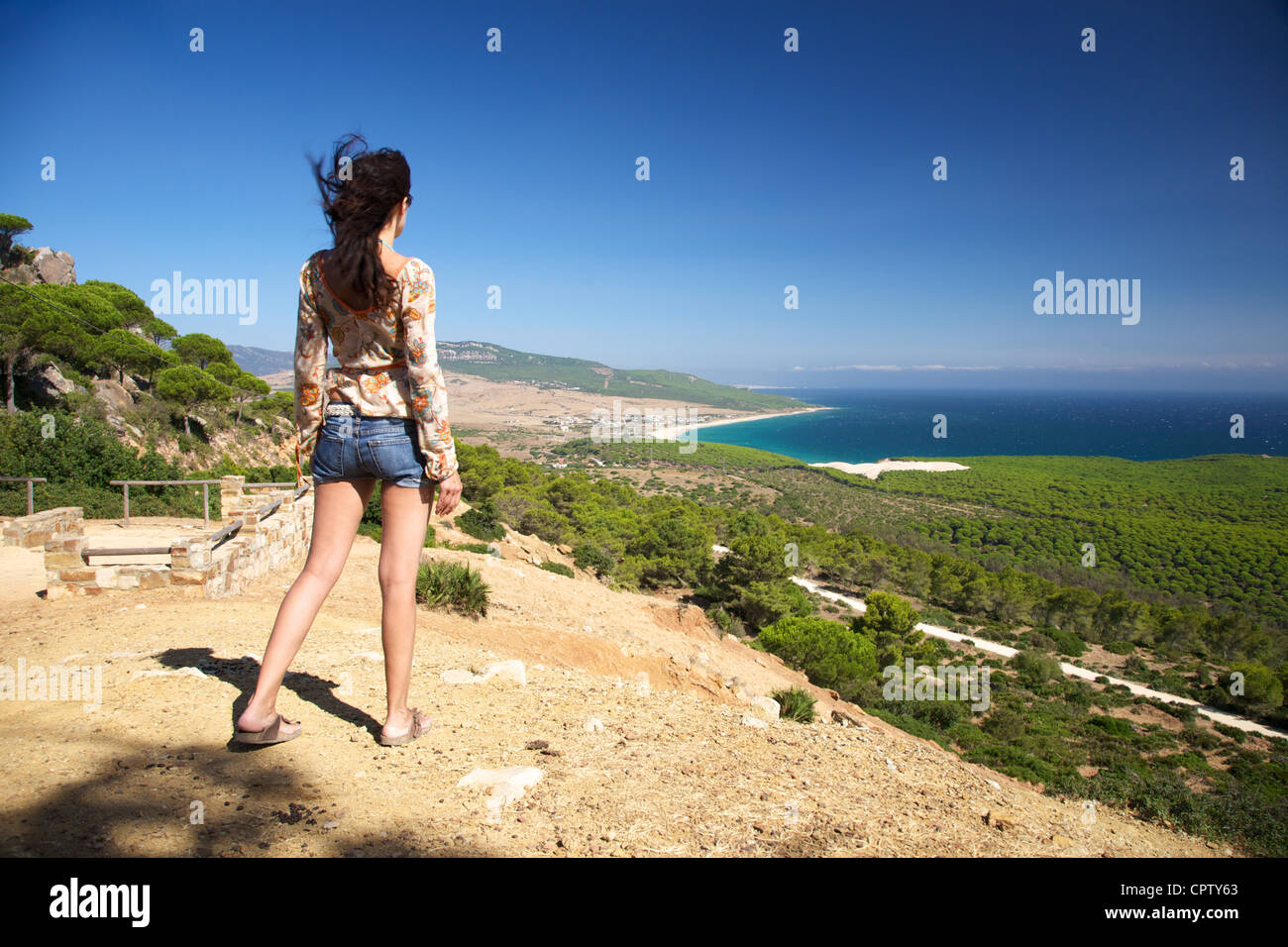 Woman over Bolonia beach at Cadiz Andalusia in Spain Stock Photo