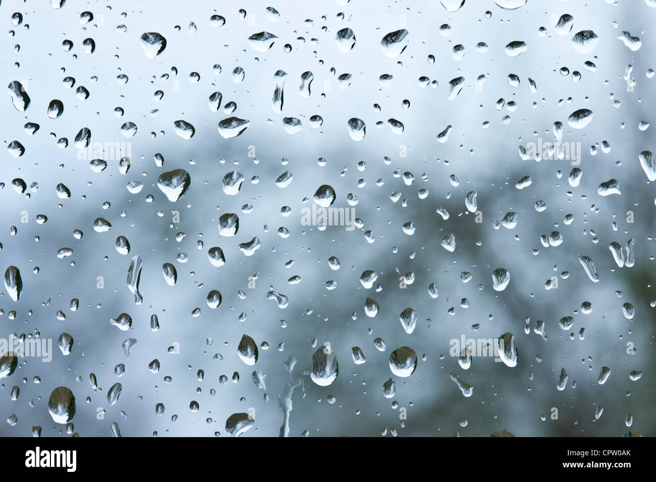 Raindrops on glass Stock Photo - Alamy