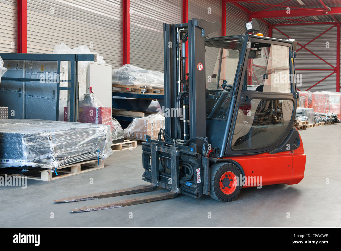 Forklift in a warehouse Stock Photo