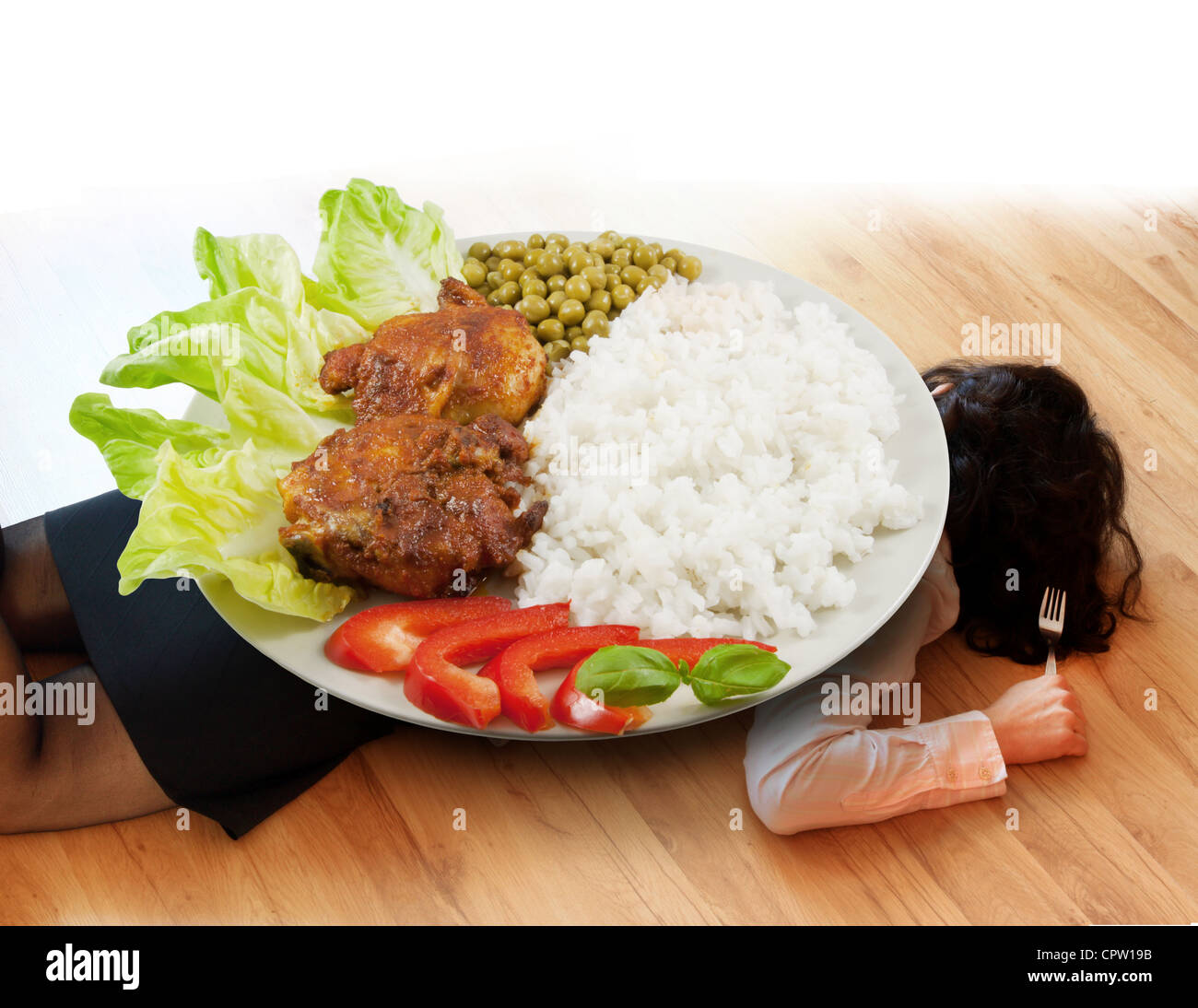 diet concept gluttony and indigestion knocked down a woman on the floor Stock Photo