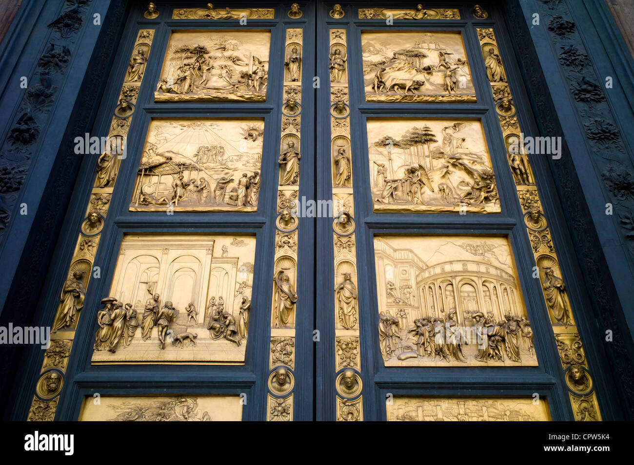Religious scenes in gold on bronze on Baptistry doors Il Duomo di