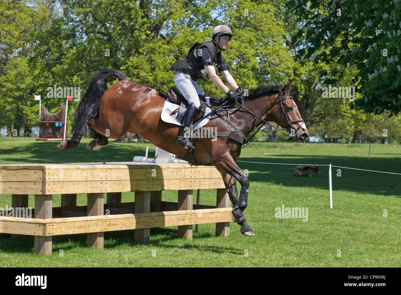 Angus Smales riding Funnyman on the cross country course at the Houghton International Horse trials 2012 Stock Photo