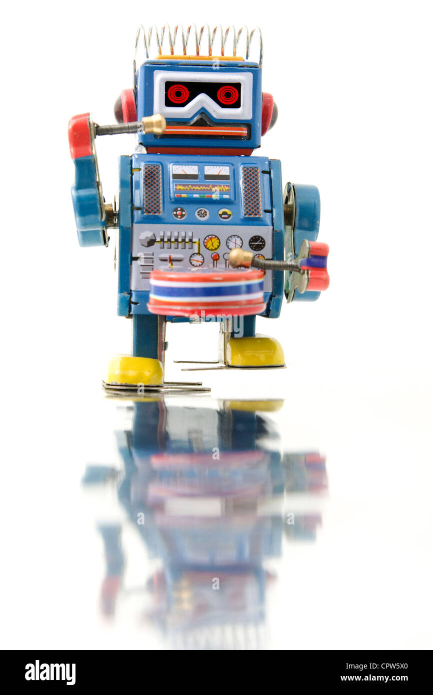 retro robot toy and reflection Stock Photo