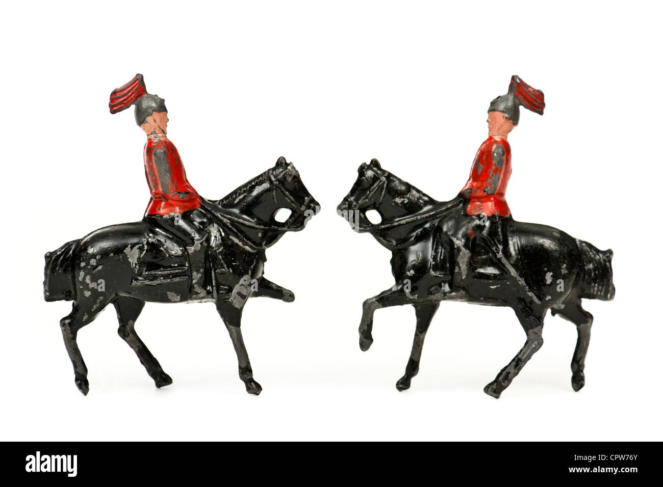 Pair of vintage lead toy soldiers on horseback Stock Photo