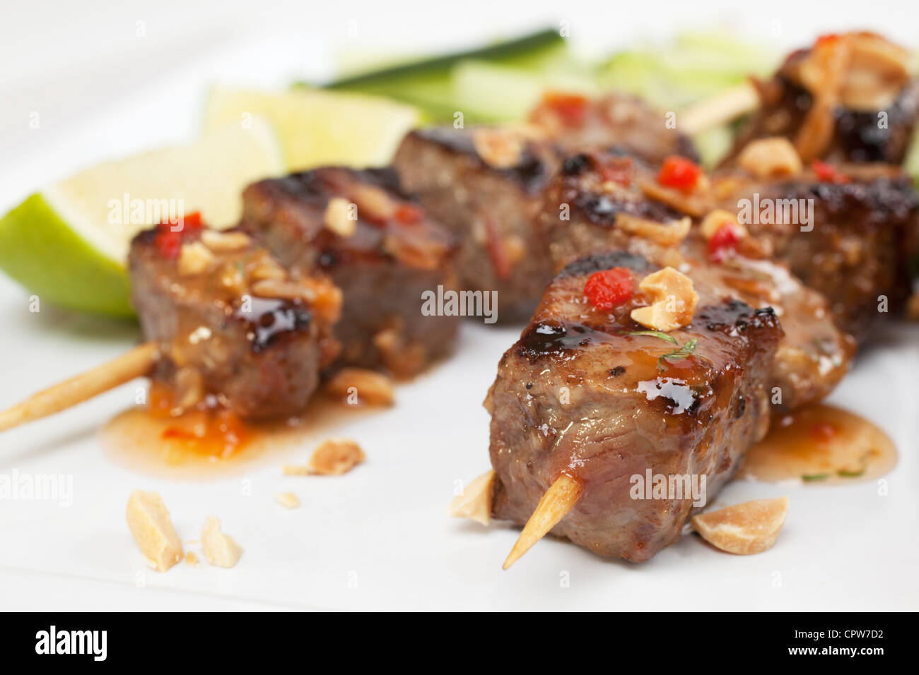 Beef kebabs with chilli sauce and roasted peanuts Stock Photo Alamy