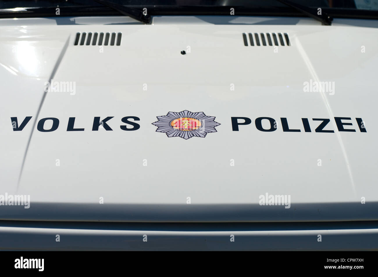 Sign of the GDR on the hood of the police car Wartburg 353 Stock Photo