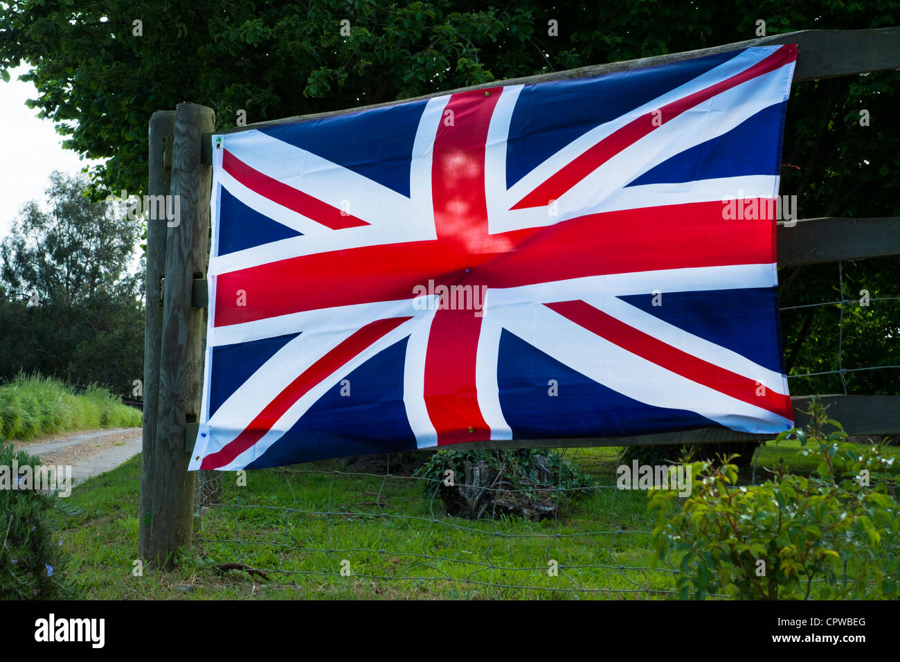 Union Jack Flag on a Fence in a Country Lane Celebrating the Queen's
