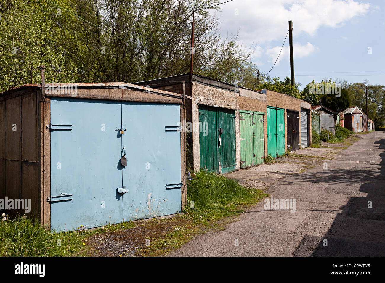 Lockup garages in lane, Ebbw Vale, Wales, UK Stock Photo
