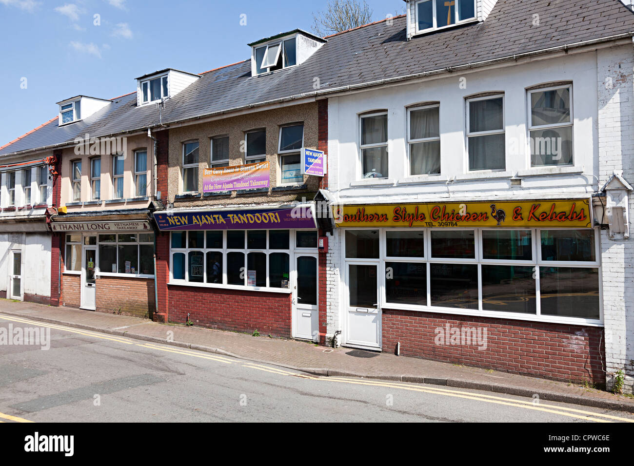 Row of take away food shops for Vietnamese, curry and kebab, Ebbw Vales