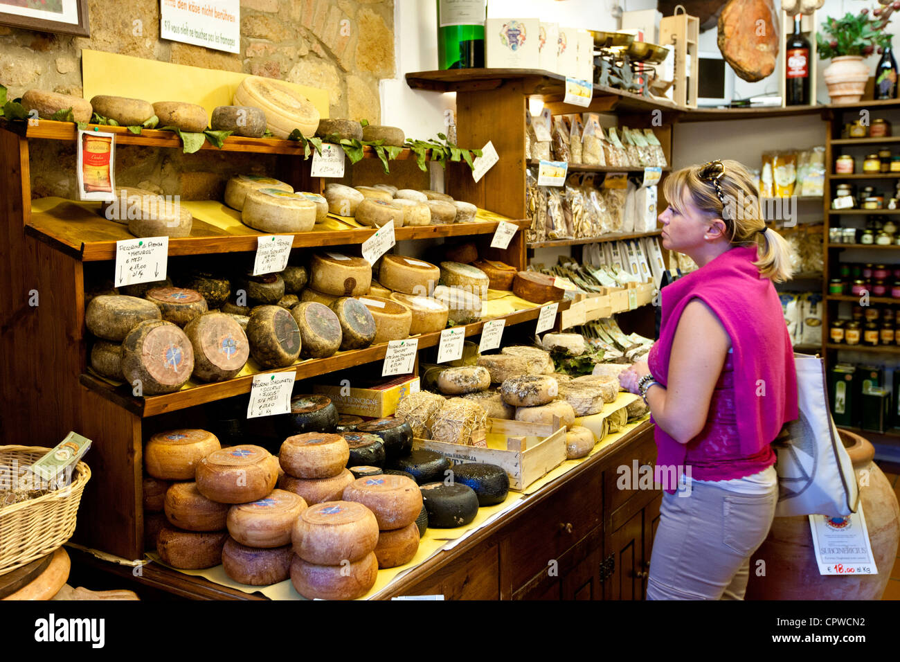 Shopper in Italian artisan cheese shop, Del Bottega Naturista selling