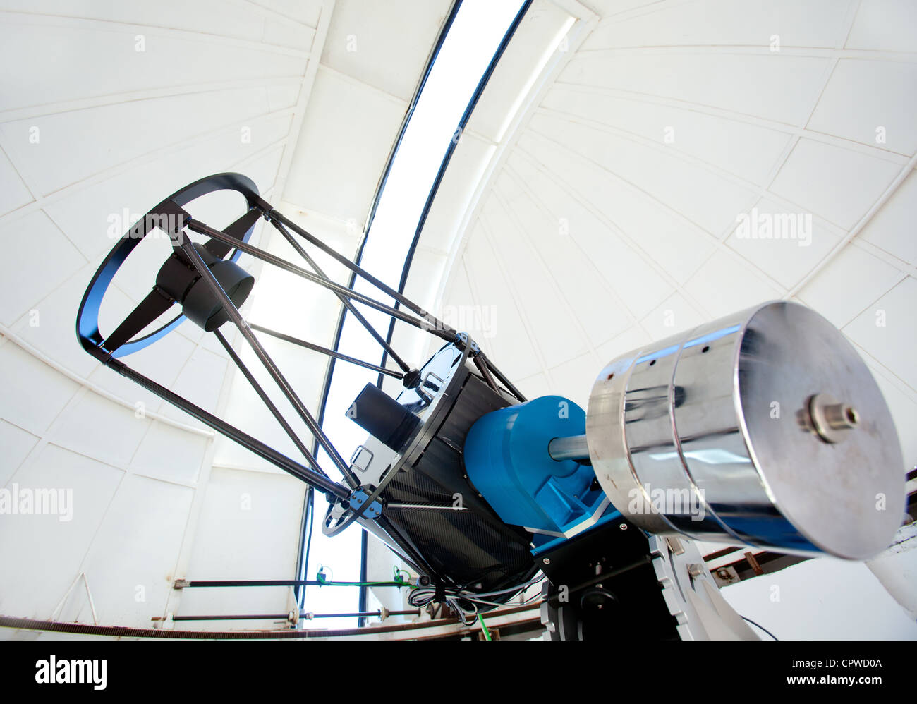 Astronomic observatory telescope inside a white dome Stock Photo