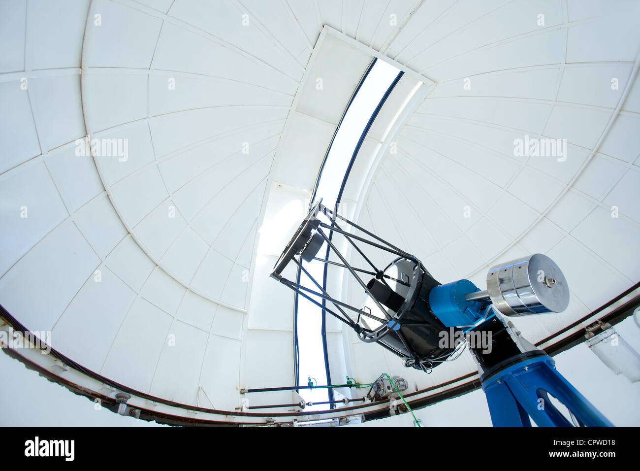 Astronomic observatory telescope inside a white dome Stock Photo