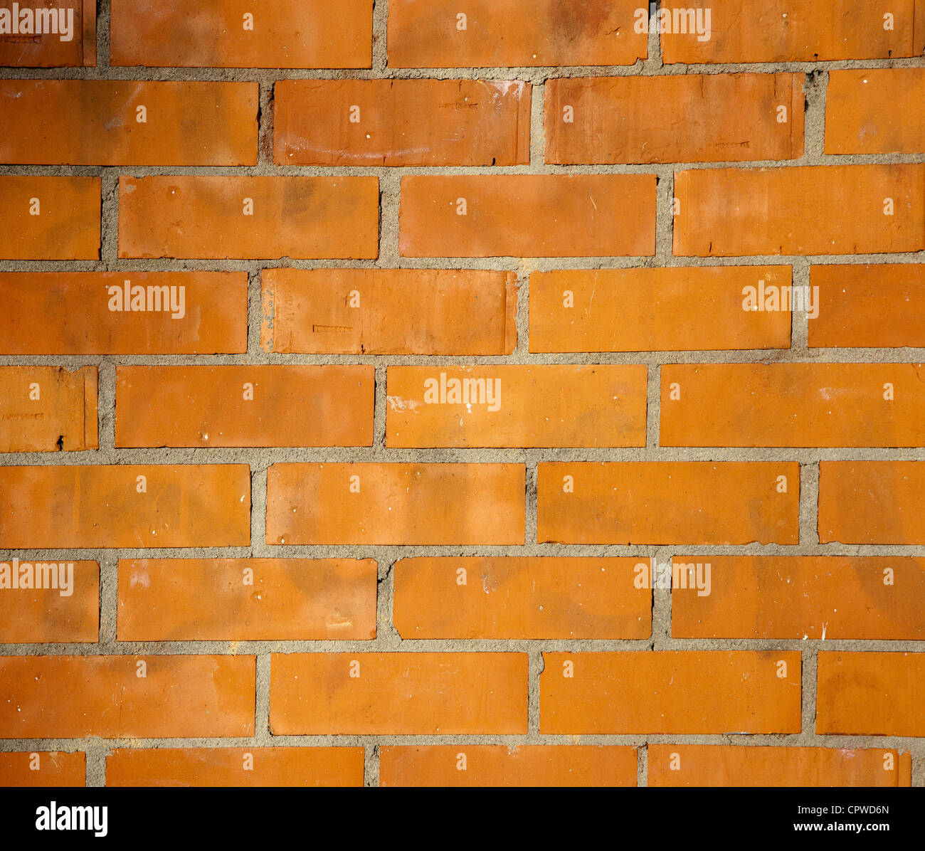 brick wall pattern texture in orange color background Stock Photo - Alamy