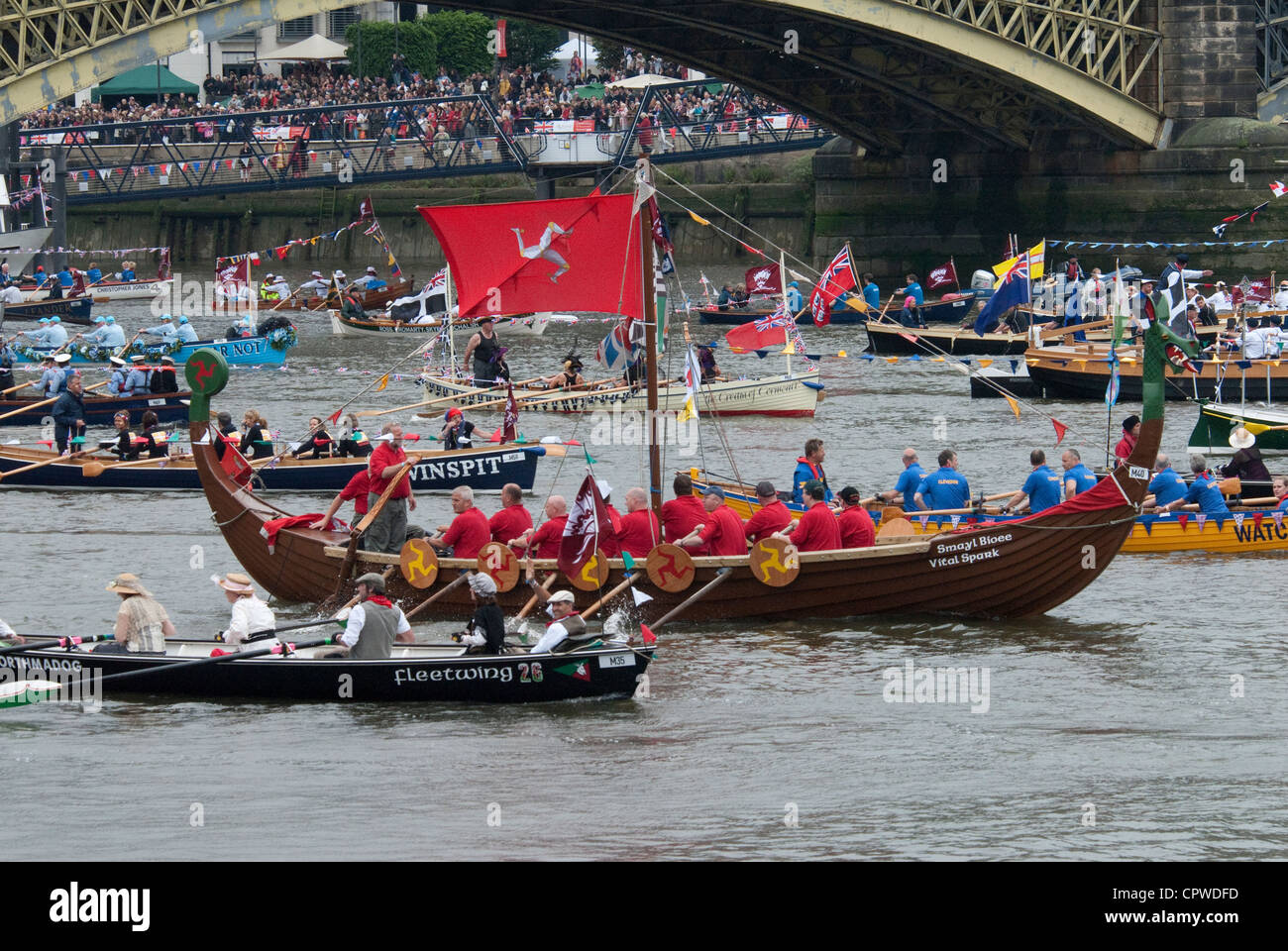 Viking Longship from the Isle of man and other rowing boats on the