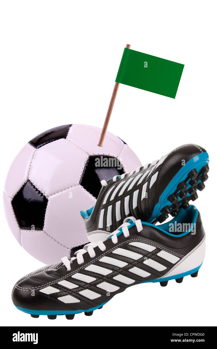Pair of cleats or football boots with a small flag of Libia Stock Photo