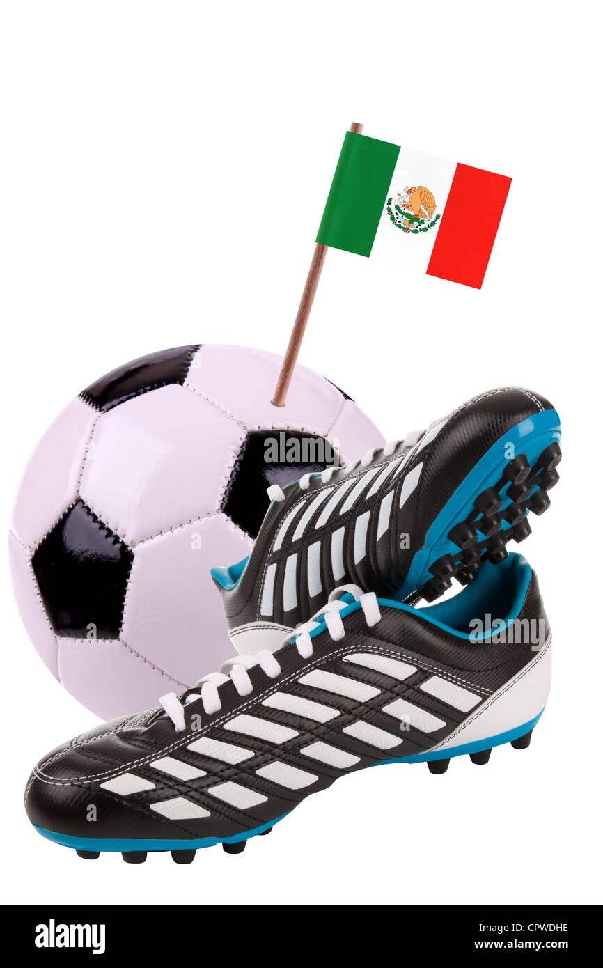 Pair of cleats or football boots with a small flag of Mexico Stock