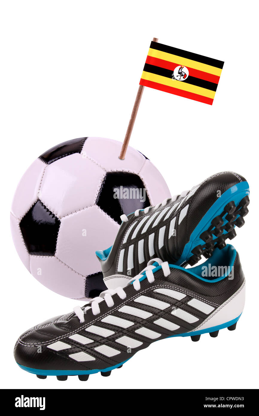 Pair of cleats or football boots with a small flag of Uganda Stock Photo -  Alamy