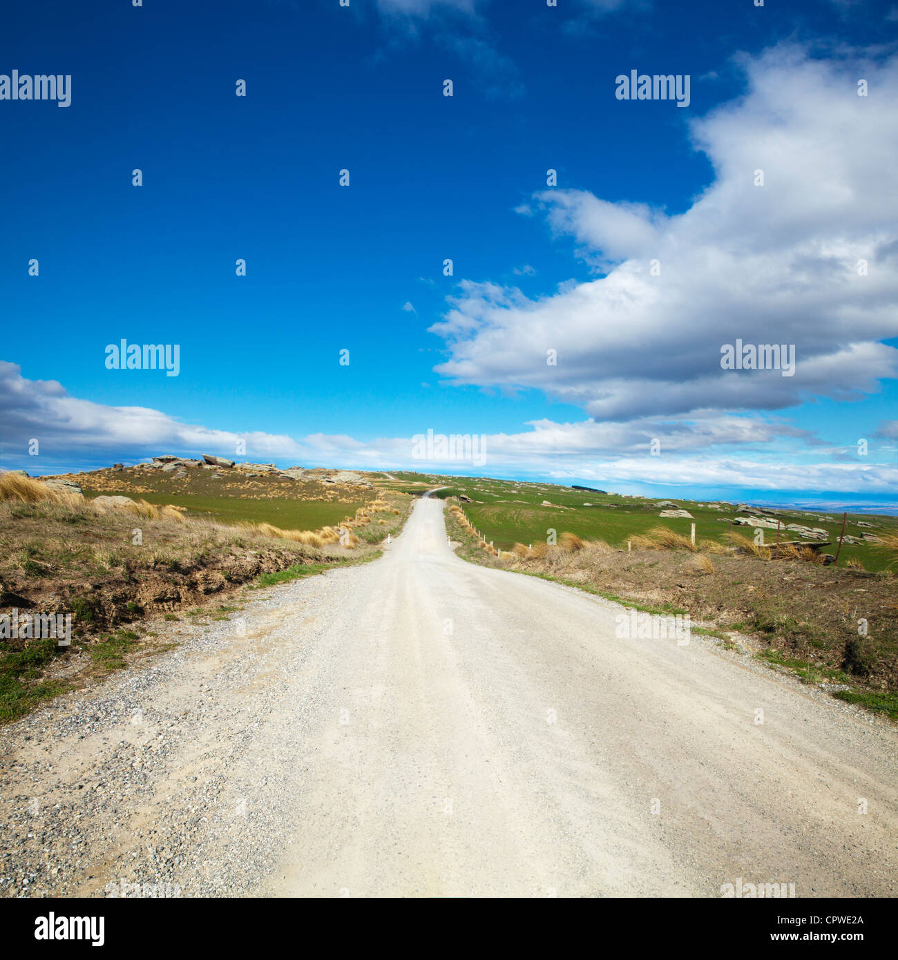 Country road in the high country of Central Otago, New Zealand. Stock Photo