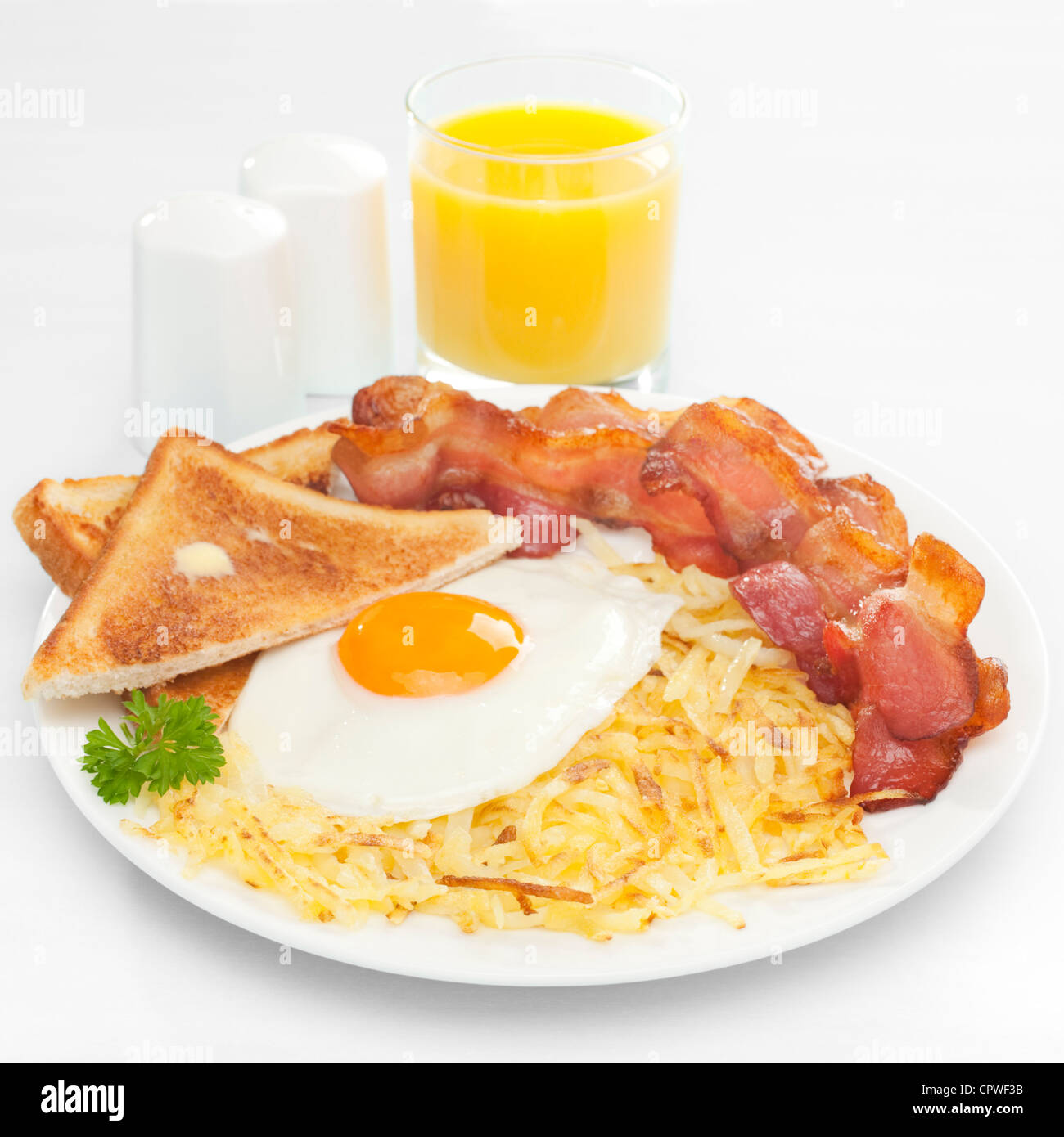 American breakfast with hash browns Stock Photo