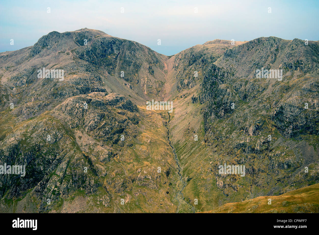Scafell Pike viewed from Crinkle Crags. Lake District National Park, Cumbria, England, United Kingdom, Europe. Stock Photo