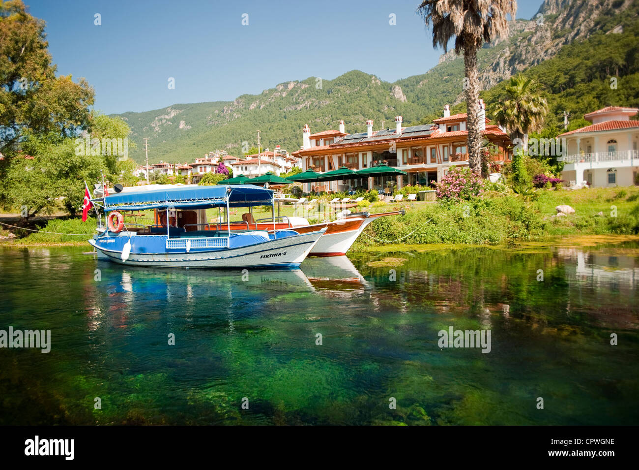 Scenic view of Kadınazmağı Creek and Ottoman Konak Hotel Akyaka Muğla Turkey Stock Photo