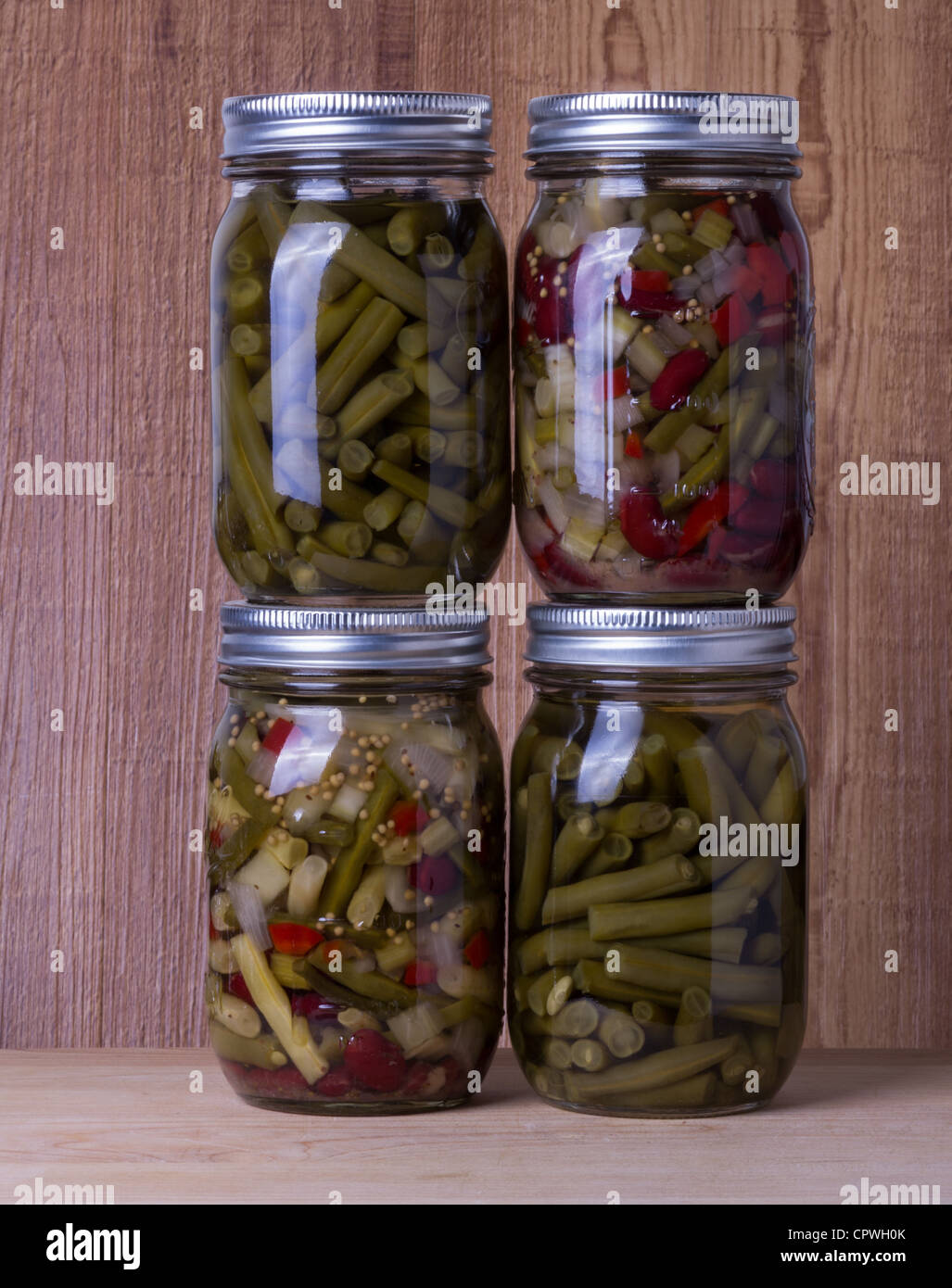 Four jars of preserved fresh beans Stock Photo Alamy
