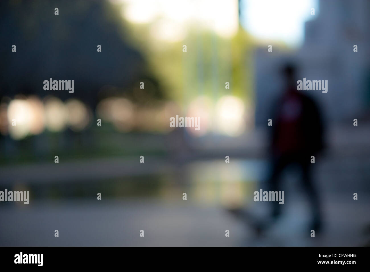 Blurred silhouette of a skater - Stock Image