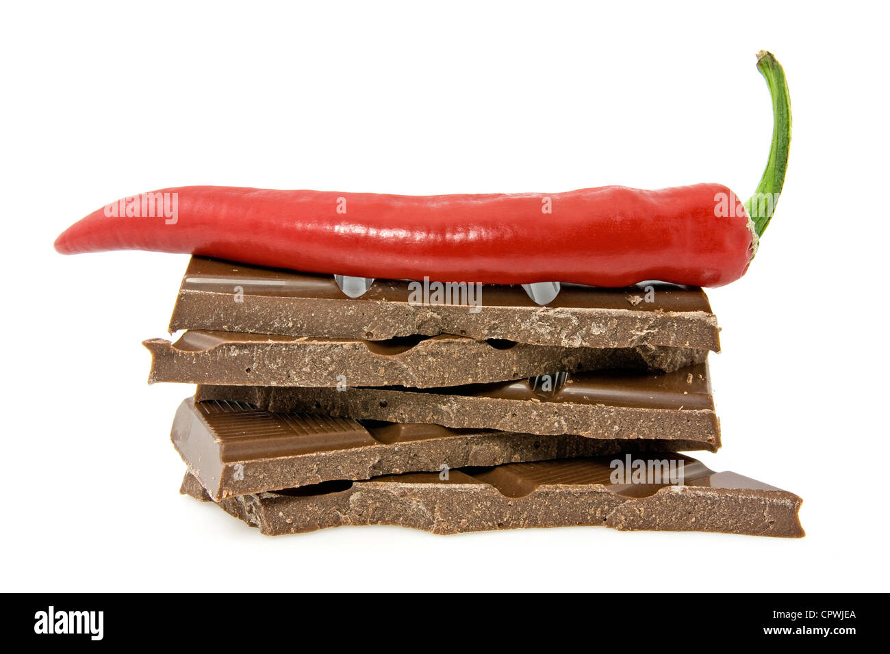chocolate and chili pepper on white background Stock Photo Alamy